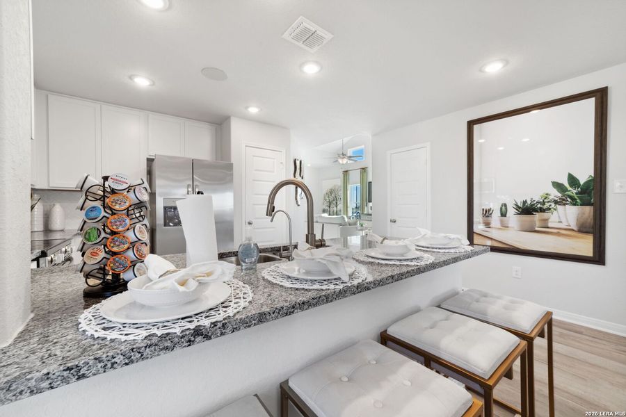 Furnished interior view inside a new home in Red Hawk Landing, San Antonio (Image 6).