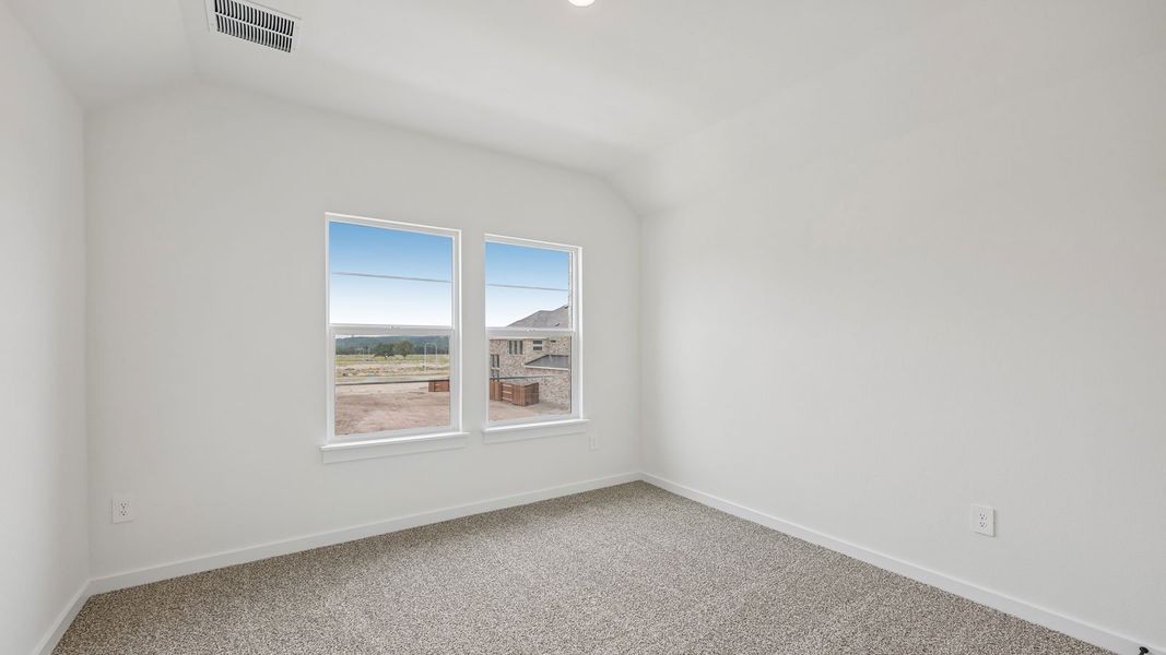 Spacious, unfurnished interior of a new home in The Enclave at Bar W Ranch, Leander (Image 30).