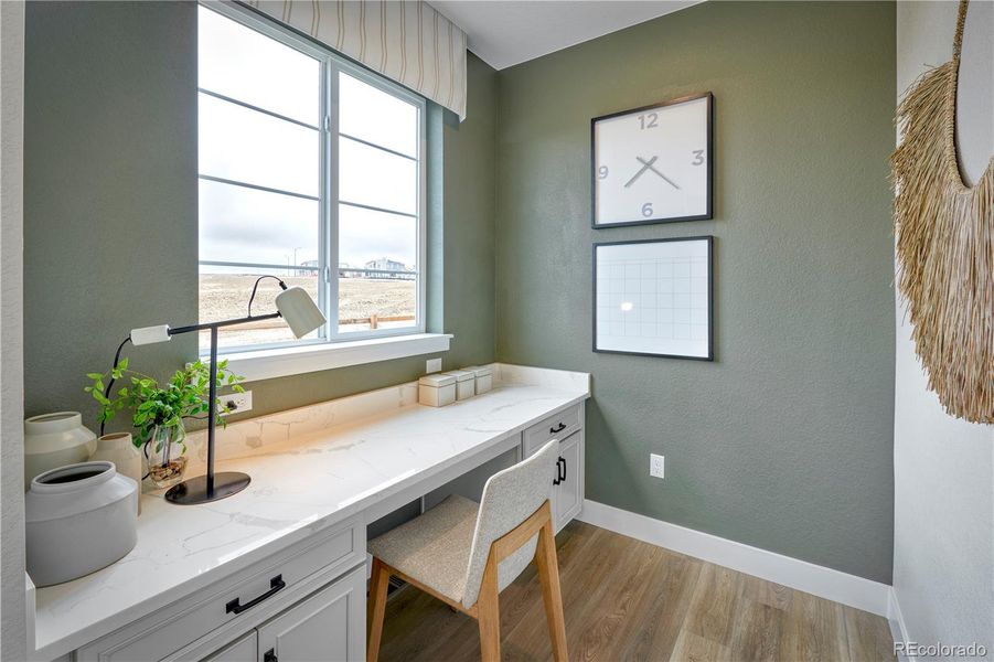 Furnished interior view inside a new home in The Aurora Highlands, Aurora (Image 5).