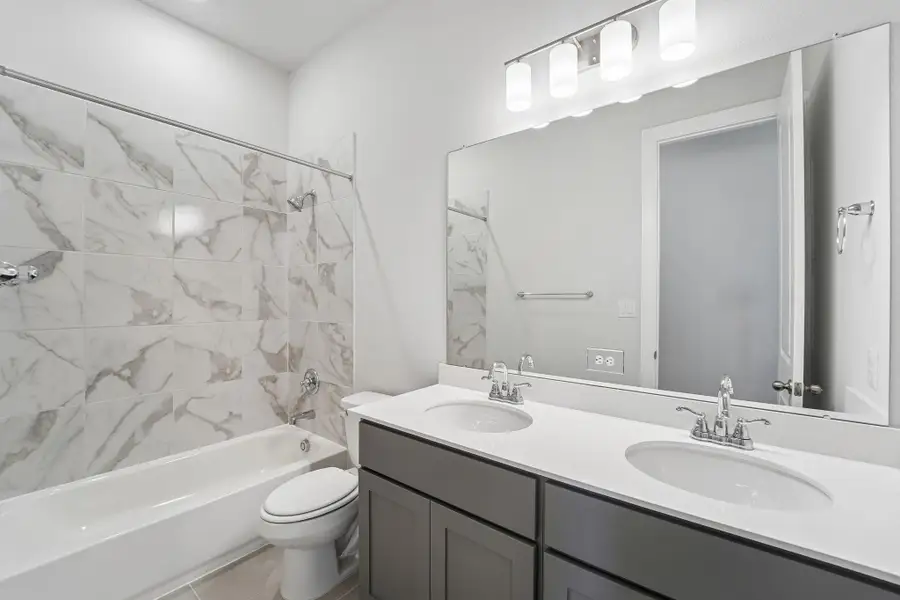 Furnished interior view inside a new home in WILDTREE 60', Montgomery (Image 18).