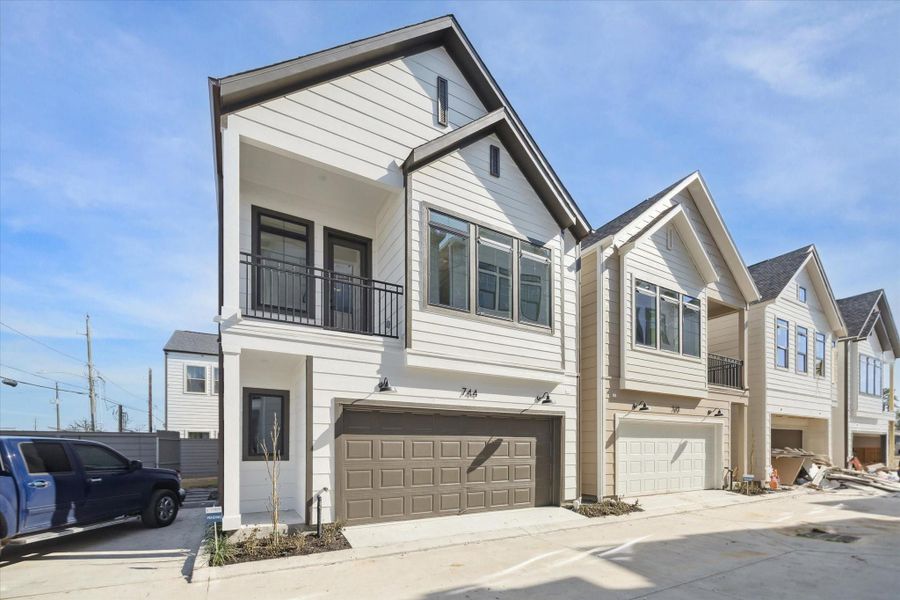 Community streetscape with elegant townhome designs Community streetscape with elegant townhome designs