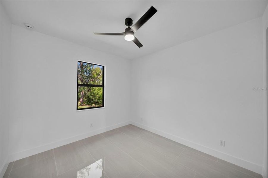 Spacious, unfurnished interior of a new home in , Port Charlotte (Image 23).