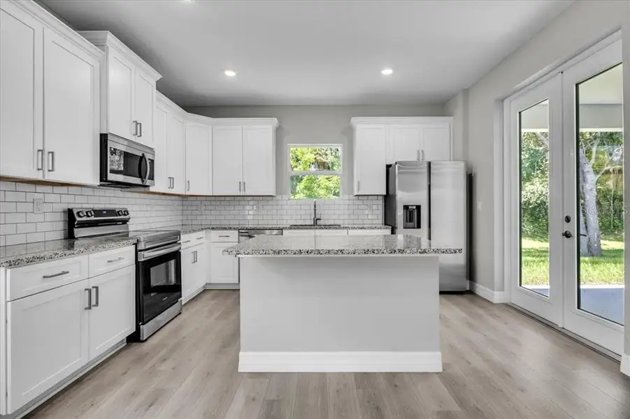 Furnished interior view inside a new home in , Punta Gorda (Image 10).