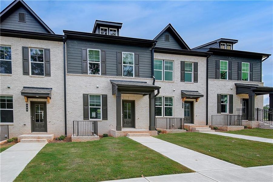 Front exterior of a new home in Daybreak, Newnan, GA, highlighting curb appeal (Image 15).