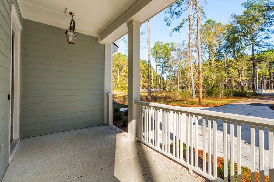 Exterior details and patio area of a home in , Awendaw (Image 34).