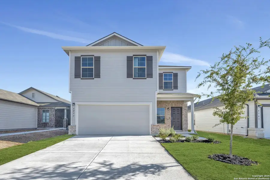 Front exterior of a new home in Park Place, New Braunfels, TX, highlighting curb appeal (Image 1).