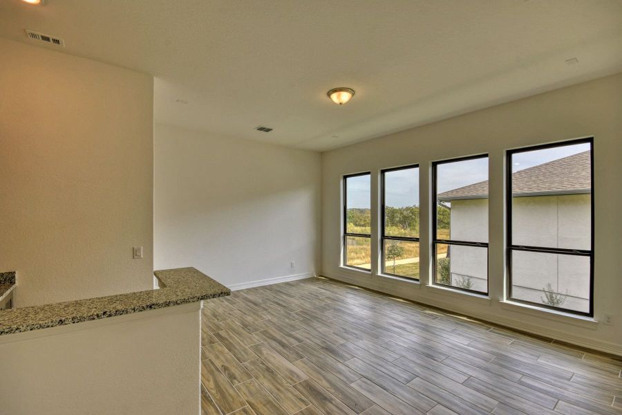Spacious, unfurnished interior of a new home in El Sonido at Campanas, San Antonio (Image 20).