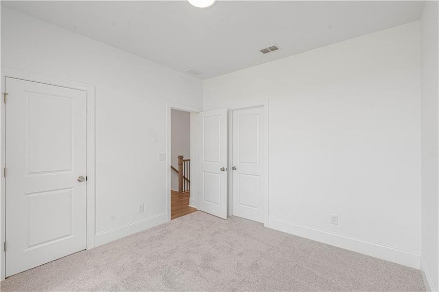 Spacious, unfurnished interior of a new home in Waterhaven, Cumming (Image 51).