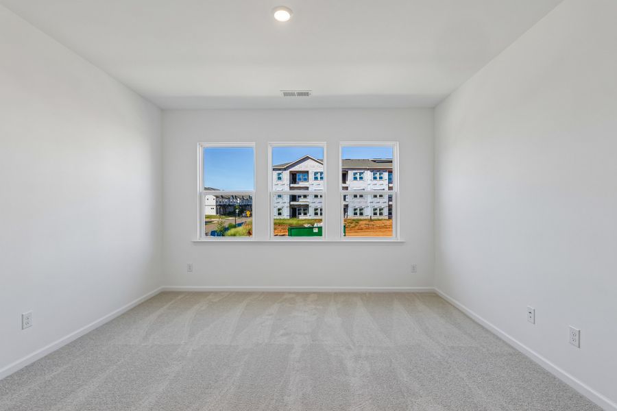 Spacious, unfurnished interior of a new home in Terraces at the Exchange, Fort Mill (Image 17).
