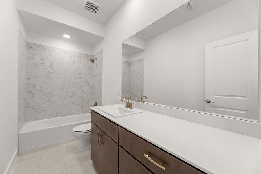 Furnished interior view inside a new home in Union Park, Little Elm (Image 9).