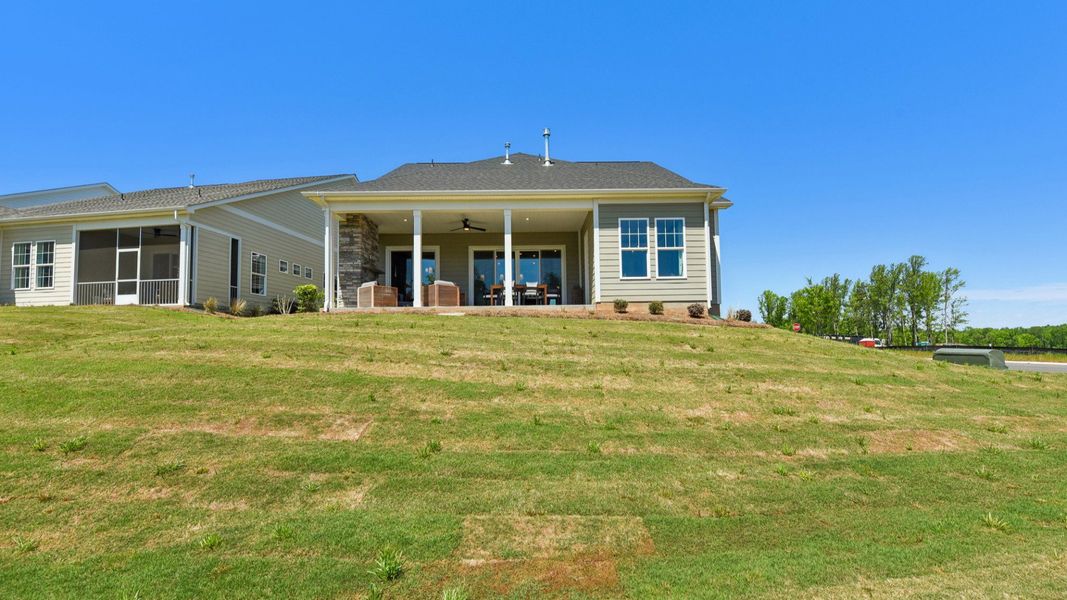 The Enthusiast Plan by DRB Homes Elevate in Brook Run, Fort Mill SC - Rear Porch The Enthusiast Plan by DRB Homes Elevate in Brook Run, Fort Mill SC - Rear Porch