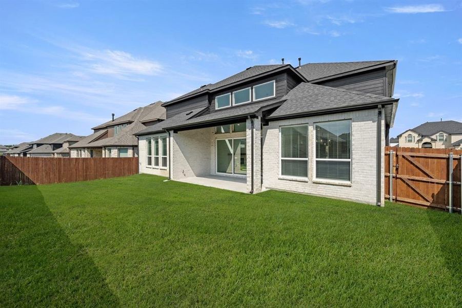 Exterior details and patio area of a home in Birdsong, Mansfield (Image 3). Exterior details and patio area of a home in Birdsong, Mansfield (Image 3).