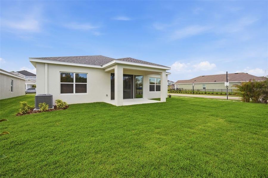 Exterior details and patio area of a home in North River Ranch, Parrish (Image 18).