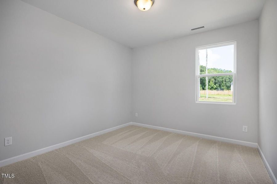 Spacious, unfurnished interior of a new home in Wellers Knoll, Lillington (Image 31).