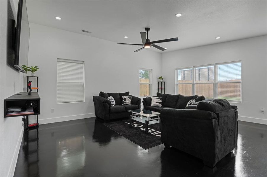 Living room featuring ceiling fan