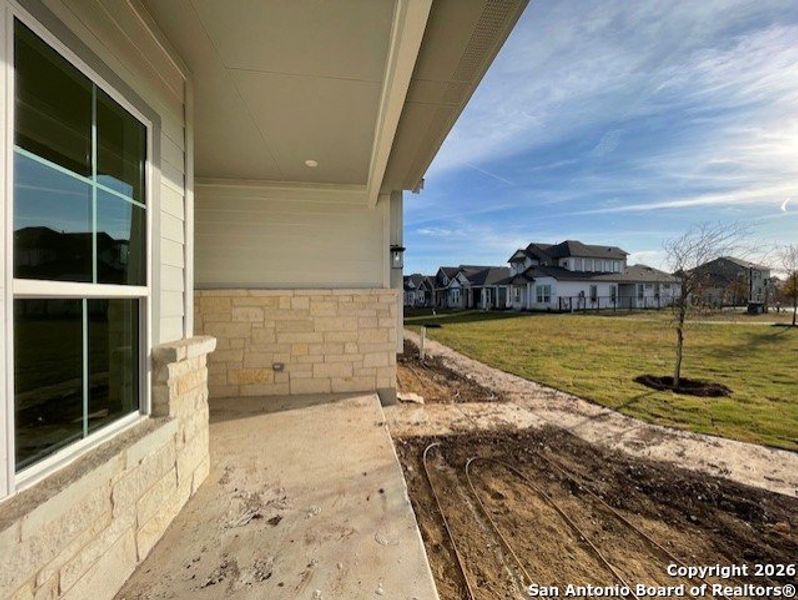 Exterior details and patio area of a home in The Crossvine, Schertz (Image 19).