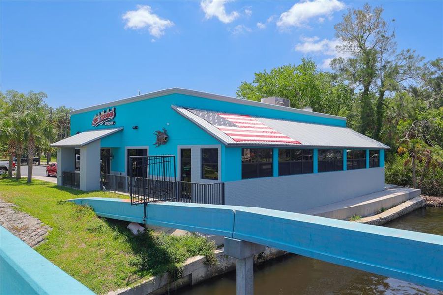Front exterior of a new home in , New Port Richey, FL, highlighting curb appeal (Image 26).
