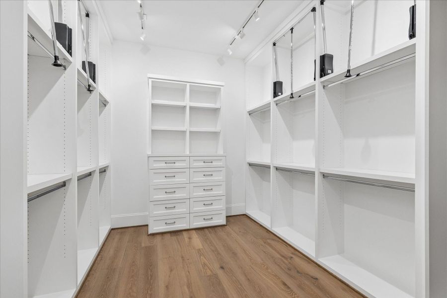 Primary closets with tons of built-ins.