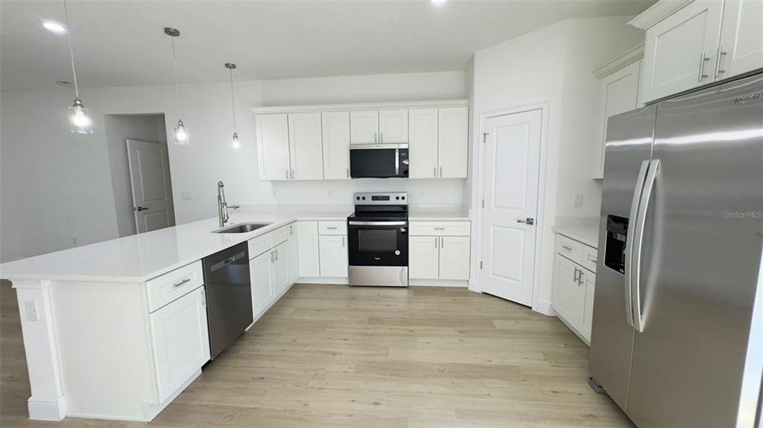 Furnished interior view inside a new home in , Dunnellon (Image 7).
