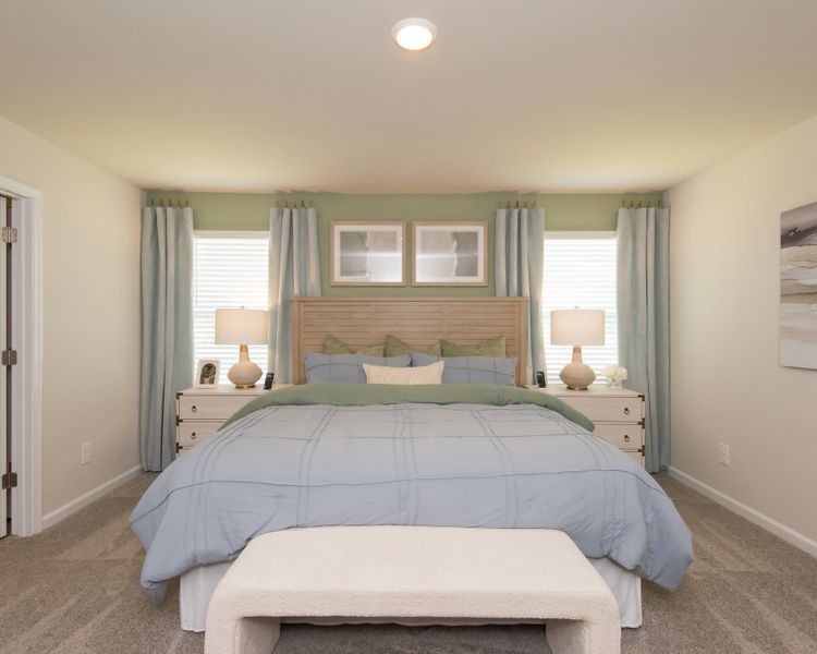 Unwind in this peaceful and spacious primary suite. Unwind in this peaceful and spacious primary suite.