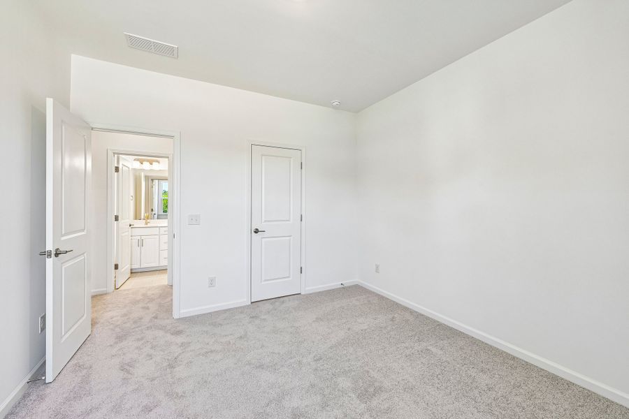 Spacious, unfurnished interior of a new home in Terraces at the Exchange, Fort Mill (Image 24).