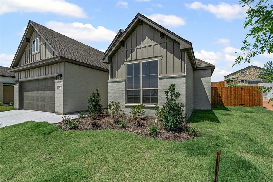 Front exterior of a new home in , Glen Rose, TX, highlighting curb appeal (Image 24). Front exterior of a new home in , Glen Rose, TX, highlighting curb appeal (Image 24).