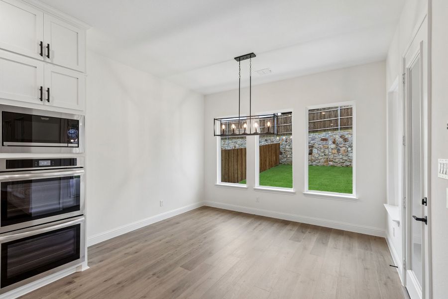 Representative unfurnished interior of a home built from the Pecos by Sandlin Homes in Settler's Glen, New Fairview (Image 17).