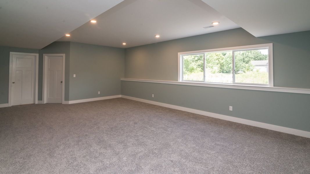 Representative unfurnished interior of a home built from the The Hartland by Norfolk Homes in Coronado Estates, Jackson (Image 62).