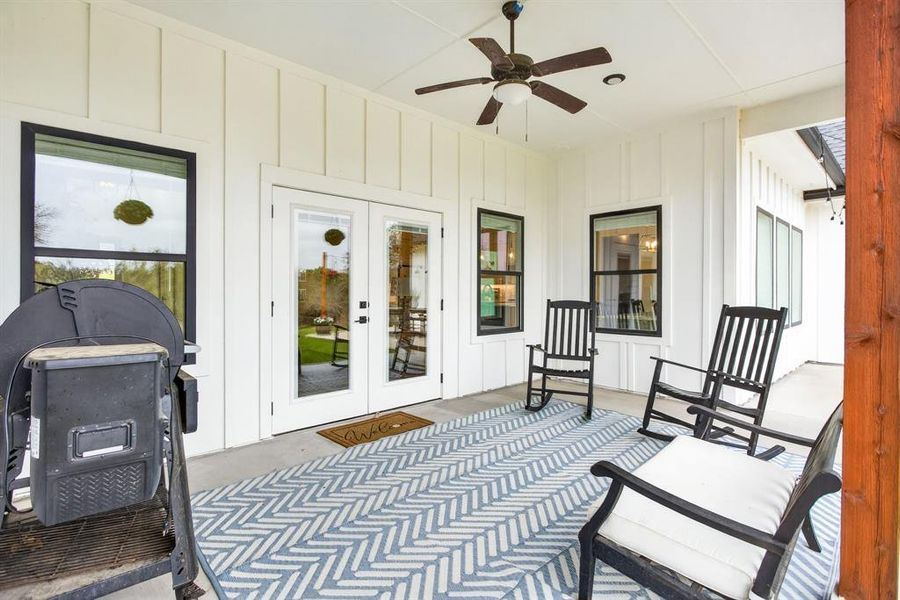 View of patio featuring french doors and a ceiling fan View of patio featuring french doors and a ceiling fan