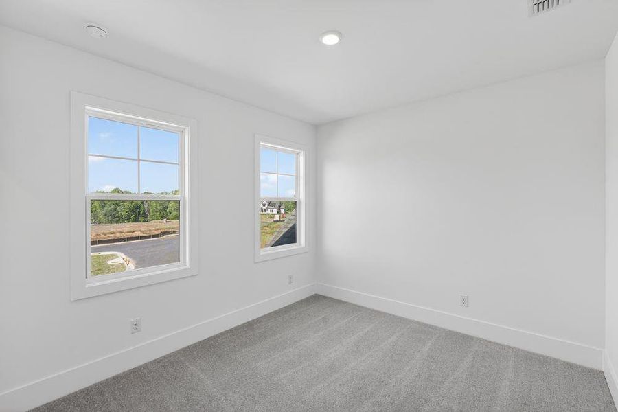 Spacious, unfurnished interior of a new home in Wayt Farm, Cumming (Image 31).
