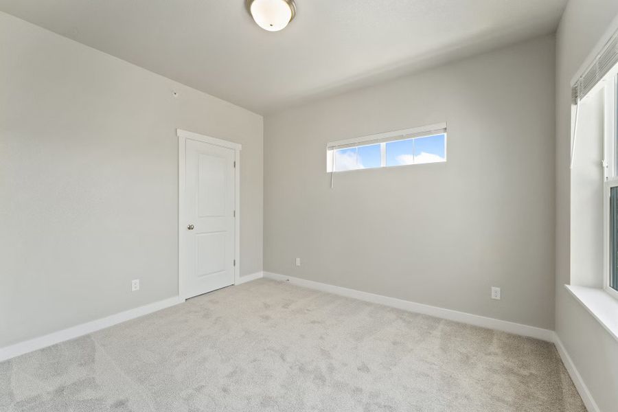 Spacious, unfurnished interior of a new home in The Lakes at Centerra - Discovery, Loveland (Image 24).