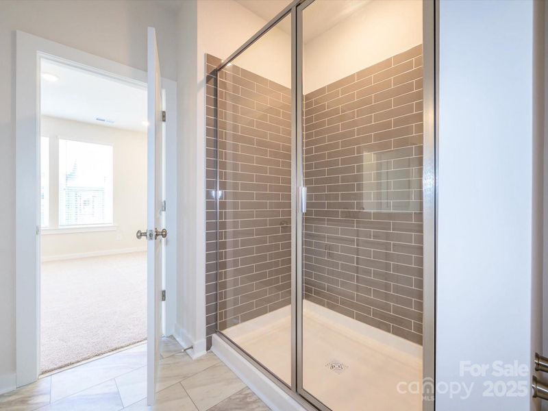 Furnished interior view inside a new home in Central Living at Craig, Charlotte (Image 7).