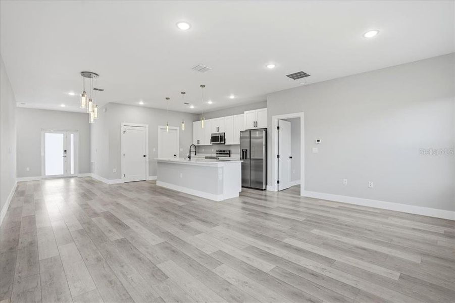 Spacious, unfurnished interior of a new home in , Port Charlotte (Image 31).