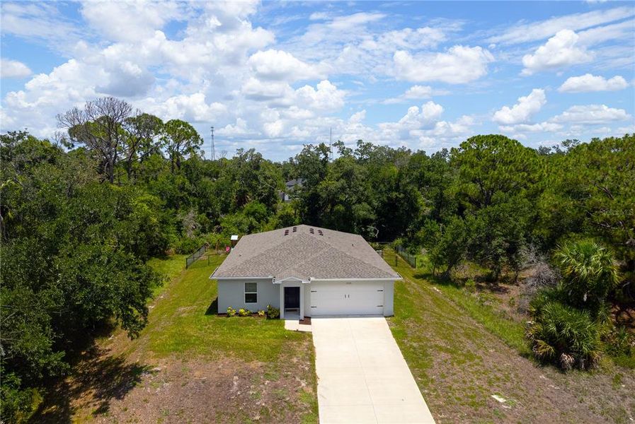 Front exterior of a new home in , Port Charlotte, FL, highlighting curb appeal (Image 1). Front exterior of a new home in , Port Charlotte, FL, highlighting curb appeal (Image 1).
