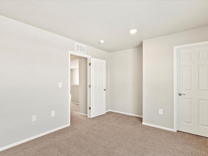 Spacious, unfurnished interior of a new home in Frontier Estates - The Flora Collection, Firestone (Image 15). Spacious, unfurnished interior of a new home in Frontier Estates - The Flora Collection, Firestone (Image 15).