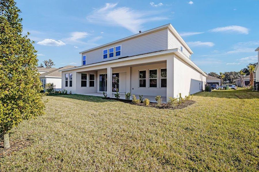 Exterior details and patio area of a home in Timber Ridge, Plant City (Image 4).