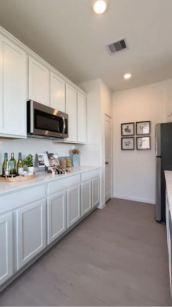 Pics are not of actual home.  They are a representative of a home of the same floor plan