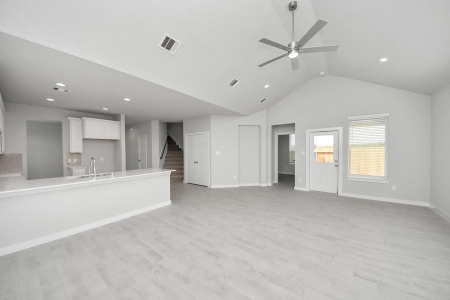 Bring your loved ones and guests together in the inviting living room! Sample photo of completed home with similar floor plan. Actual colors and selections may vary. Bring your loved ones and guests together in the inviting living room! Sample photo of completed home with similar floor plan. Actual colors and selections may vary.