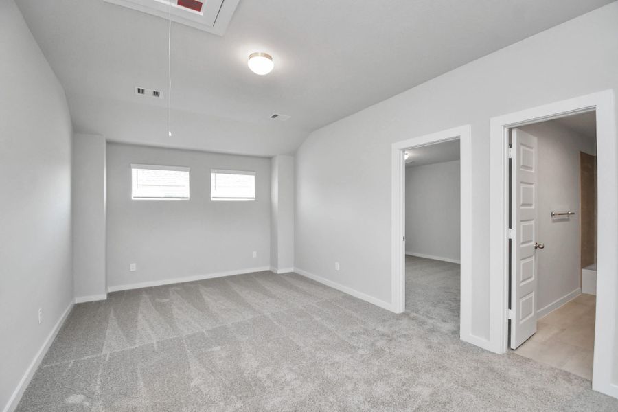 Come upstairs and enjoy a day of leisure in this fabulous game room! This is the perfect hangout spot or adult game room! Features plush carpet, high ceilings, custom paint and windows for plenty of natural light. Sample photo of completed home with similar floor plan. Actual colors and selections may vary. Come upstairs and enjoy a day of leisure in this fabulous game room! This is the perfect hangout spot or adult game room! Features plush carpet, high ceilings, custom paint and windows for plenty of natural light. Sample photo of completed home with similar floor plan. Actual colors and selections may vary.