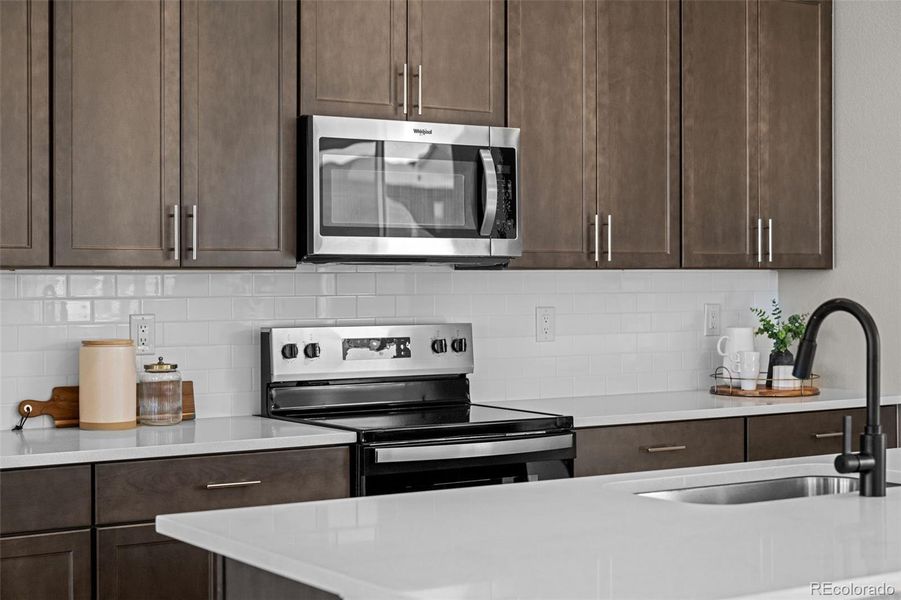 Furnished interior view inside a new home in Painted Prairie, Aurora (Image 10).