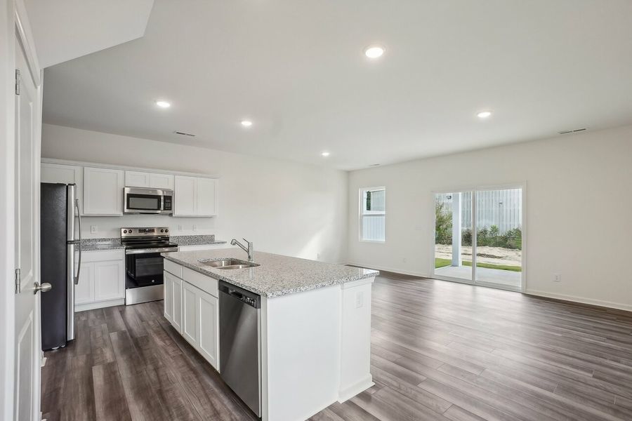 Furnished interior in a model home at Walker Station in Wilson (Image 8).