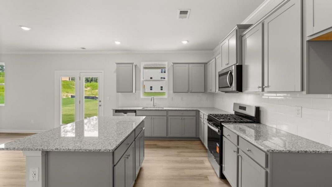 Furnished interior view inside a new home in Northwoods at Mirror Lake, Villa Rica (Image 11).
