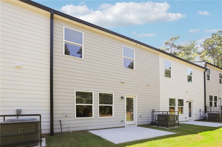 Exterior details and patio area of a home in Artisan Walk, Fairburn (Image 3).