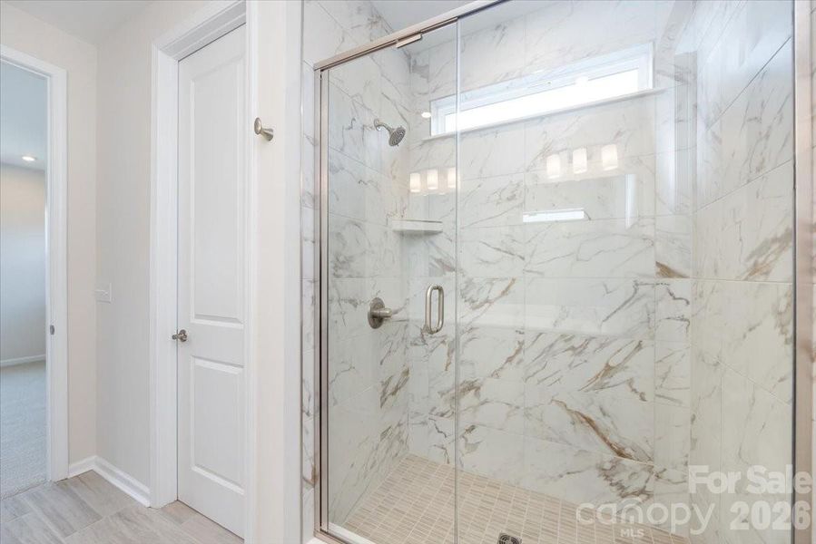 Primary Bathroom with Walk-In Tiled Shower