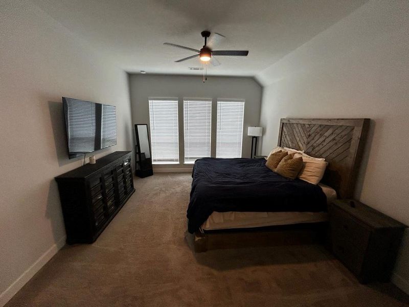 Furnished interior view inside a new home in Grand Central Park 45', Conroe (Image 12).