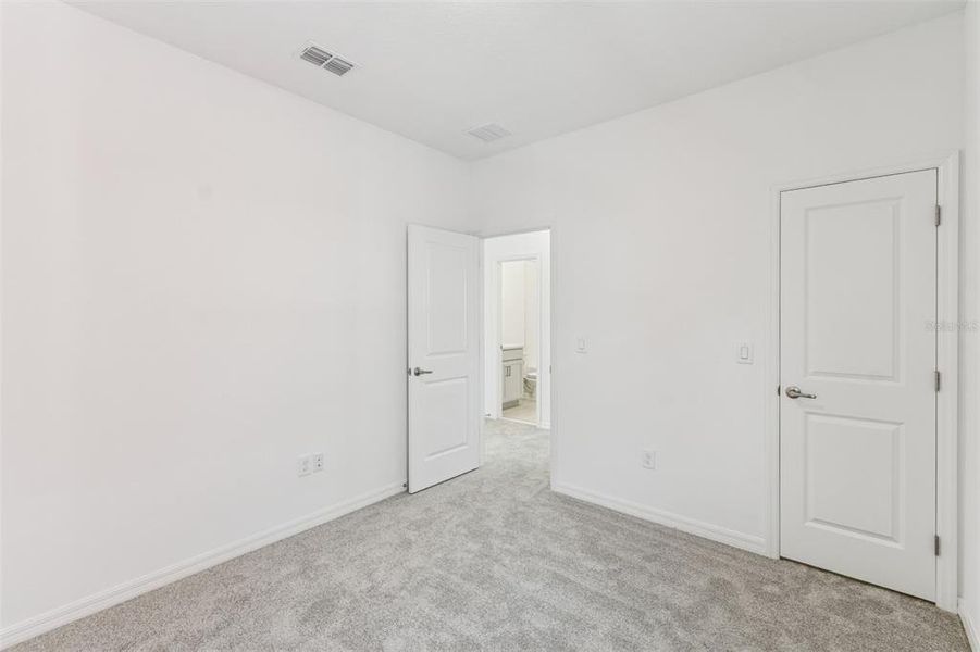 Spacious, unfurnished interior of a new home in Laureate Park at Lake Nona - Garden Series, Orlando (Image 32).