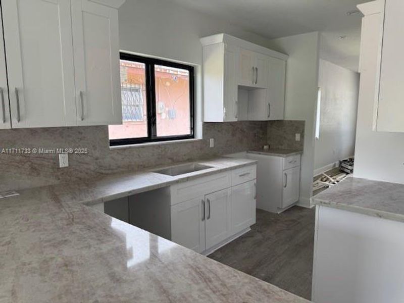 Furnished interior view inside a new home in , Miami Gardens (Image 5).