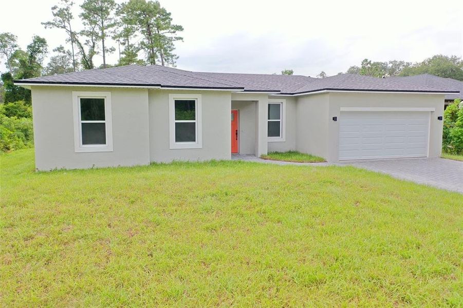Front exterior of a new home in , Deland, FL, highlighting curb appeal (Image 19).