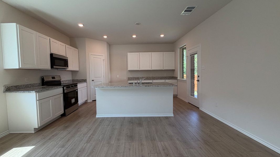 Furnished interior view inside a new home in Wildcat Ranch, Crandall (Image 6).