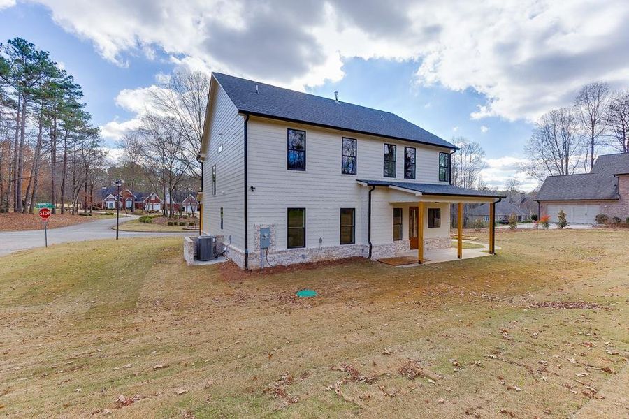 Exterior details and patio area of a home in , Flowery Branch (Image 3).